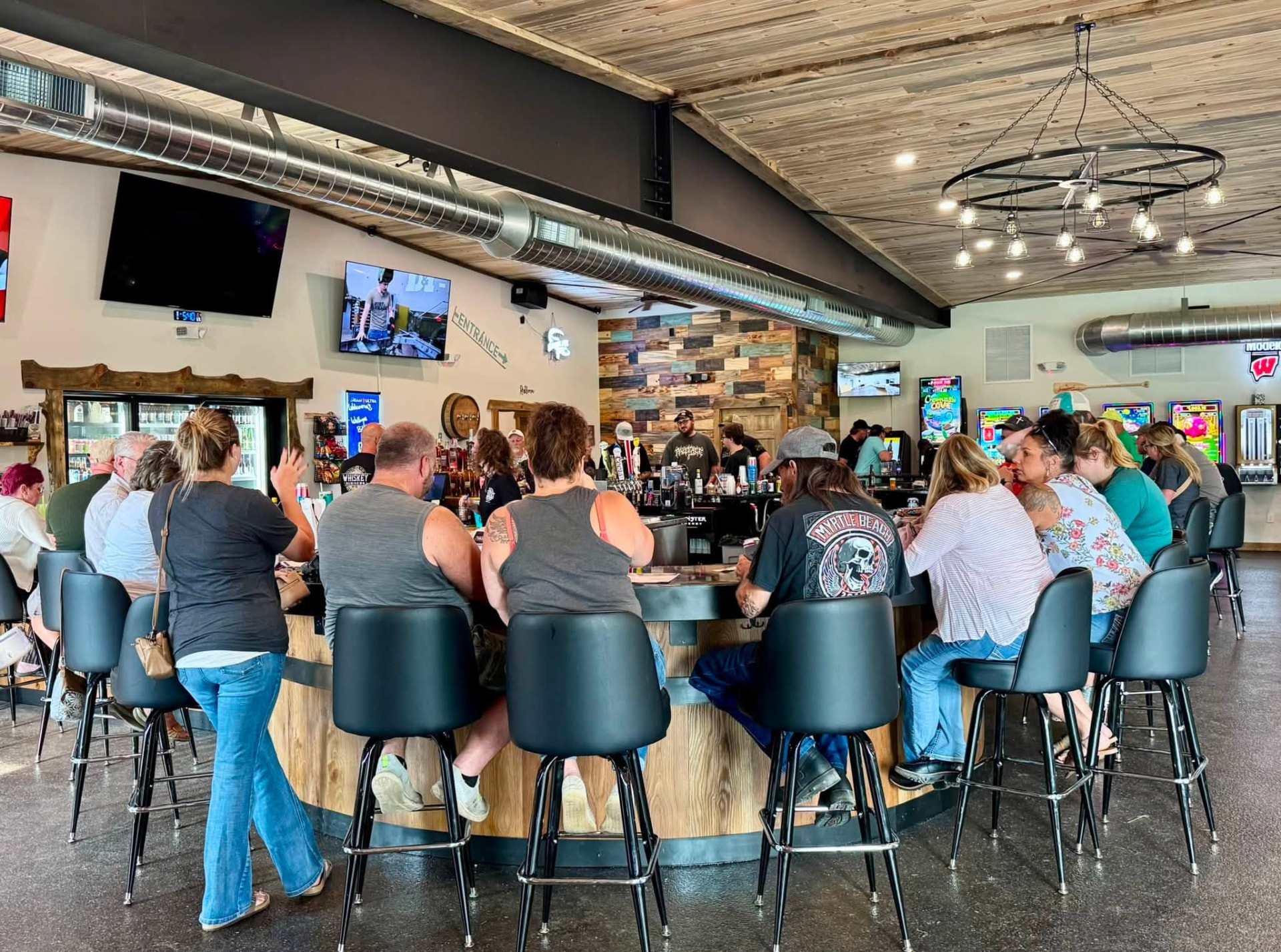 Guests gathered around the Whiskey Business bar
